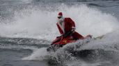 Santa Claus brasileño cambia trineo por jet ski y reparte juguetes y alegrías a niños discapacitados