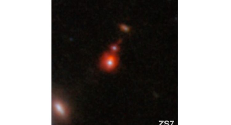 Telescopio Webb descubre fusión de dos enormes agujeros negros que datan del principio del universo
