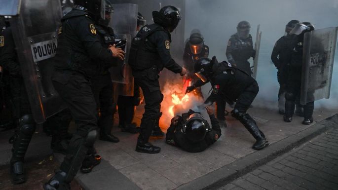 Enfrentamientos y agresiones: las fotografías de la marcha del 2 de octubre