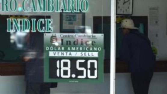 Peso pierde tras datos de inflación de diciembre