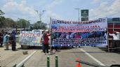 Foto ilustrativa de la nota titulada: Van nueve horas de bloqueo en la Autopista del Sol; ejidatarios exigen solución a conflicto agrario
