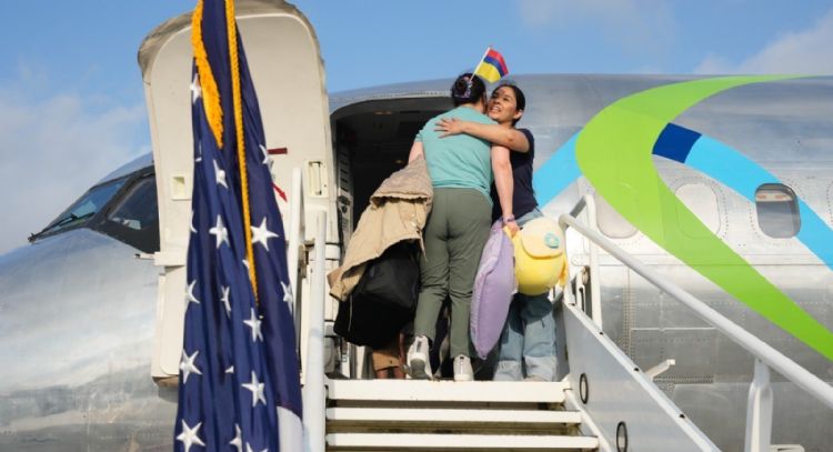 Primer vuelo con “autodeportados” de EU llega a Honduras