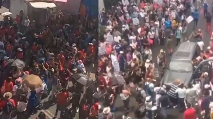 Captan en VIDEO a conductor que intenta atravesar manifestación generando tensión en CDMX