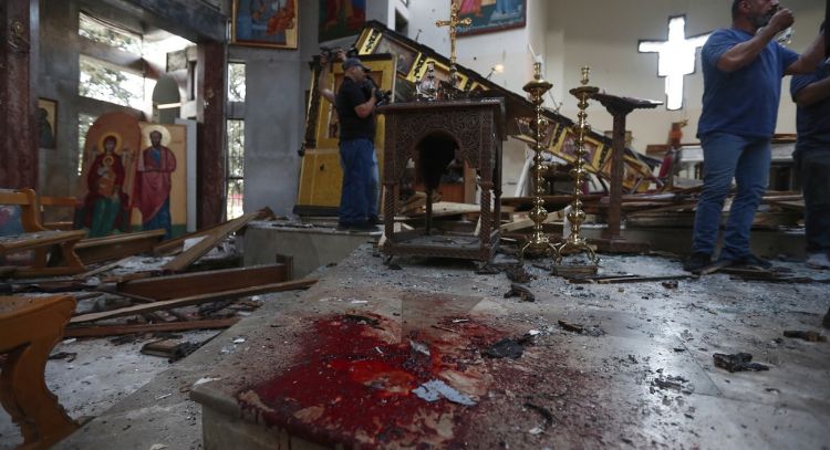 Al menos 13 cristianos mueren en un atentado contra una iglesia en Damasco