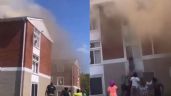 Foto ilustrativa de la nota titulada: VIDEO: mujer lanza a su bebé por la ventana tras explosión en edificio