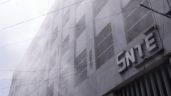 Foto ilustrativa de la nota titulada: Maestros disidentes vandalizan instalaciones del SNTE (Video)