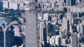 Foto ilustrativa de la nota titulada: El escalador Alex Honnold llega a la cima del rascacielos Taipei 101 sin cuerdas (Video)