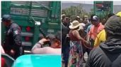Foto ilustrativa de la nota titulada: Captan a civiles armados y policías en desalojo violento de la CNTE en Mitla; FGEO investiga