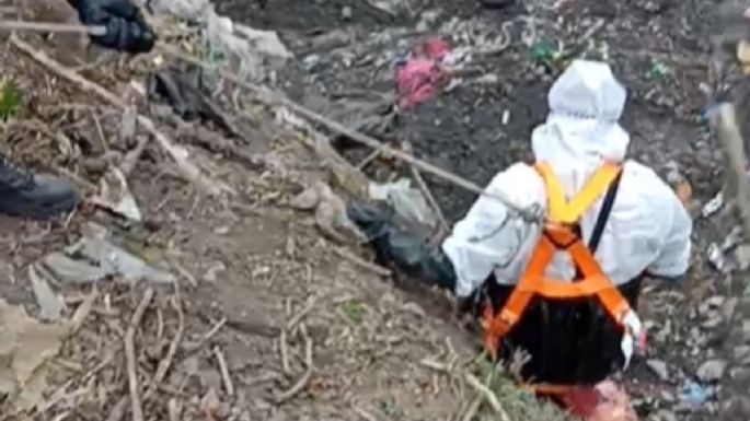 Colectiva feminista encuentra cuerpo en canal de aguas negras de Nextlalpan