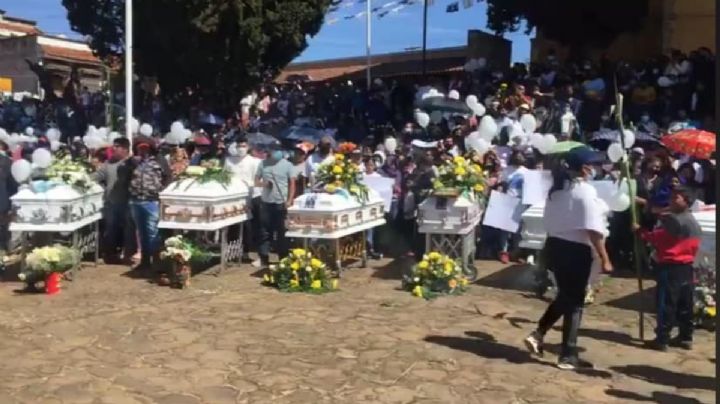 Con protesta y quema de camiones despiden a los 11 asesinados en Tangamandapio