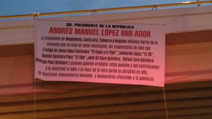 Reciben a AMLO con narcomantas en Caborca, Sonora