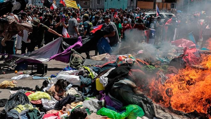 "Vergüenza nacional" la quema de pertenencias de migrantes venezolanos: INDH de Chile