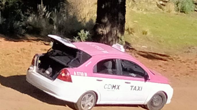 Hallan en el Ajusco dos cuerpos dentro de la cajuela de un taxi