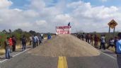 Bloquean carretera transístmica en rechazo a la detención del agente municipal de Puente Madera