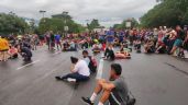 Migrantes bloquean carretera en Chiapas para exigir salvoconductos para llegar a la frontera con EU