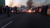 Pobladores de Xalmimilulco cierran la autopista México-Puebla tras agresión de policías (Video)