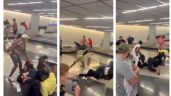 Captan pelea campal entre hombres y mujeres en el aeropuerto de Chicago (Videos)