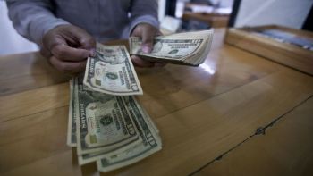 Peso continúa con tendencia a la baja; se ubica entre 19.93 y 20.09 unidades por dólar