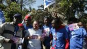 Atiza líder de Morena en CDMX críticas a Santiago Taboada por migrantes hatianos en mitin de campaña