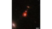 Telescopio Webb descubre fusión de dos enormes agujeros negros que datan del principio del universo