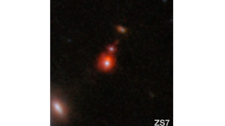 Telescopio Webb descubre fusión de dos enormes agujeros negros que datan del principio del universo