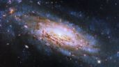 Hubble observa una galaxia a 50 millones de años luz con un agujero negro voraz