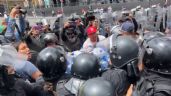 Se enfrentan policías y comerciantes que bloquearon Eje Central; hay dos heridos (Videos)