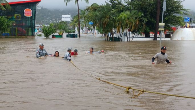 John vuelve a tocar tierra en el Pacífico mexicano y deja varios muertos y graves inundaciones