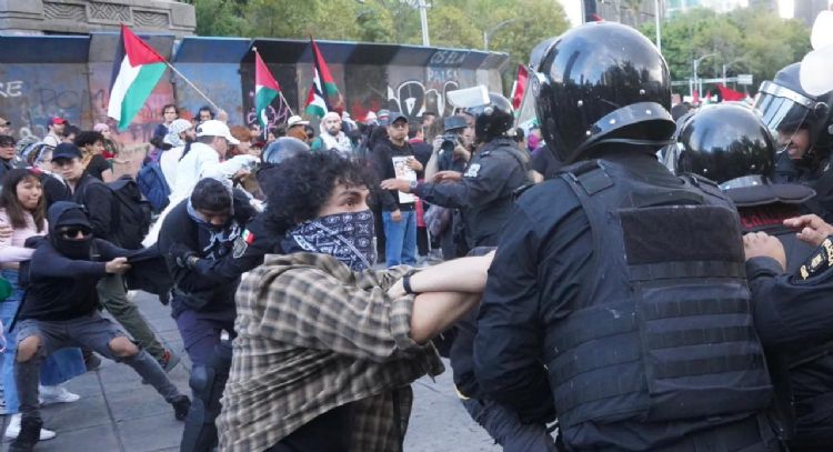 Encapuchados causan destrozos durante marcha en apoyo a Palestina (Video)