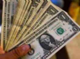 Peso pierde ante fortalecimiento del dólar