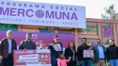 Foto ilustrativa de la nota titulada: Brugada entrega vales Mercomuna y anuncia que para 2026 duplicará los apoyos