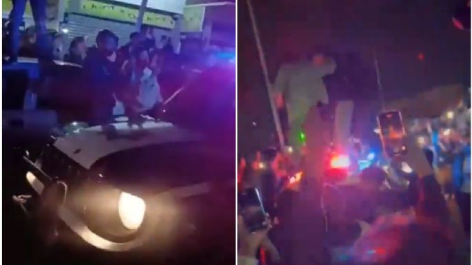 Jóvenes que arman arrancones brincan sobre patrulla con policías en su interior en Puebla (Video)