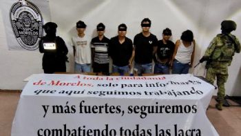 Detienen a 6 presuntos integrantes de La Familia Michoacana cuando colocaban narcomanta en Morelos