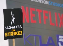 El sindicato de guionistas y los estudios de Hollywood alcanzan un acuerdo preliminar de cuatro años