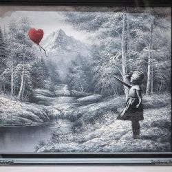 "Niña con globo": Obra de Bansky se vende por 17.9 millones de dólares