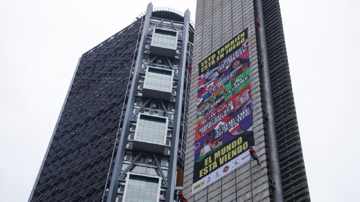 Greenpeace, Amnistía y más de 100 ONG despliegan lona en Estela de Luz; piden encuentro con Sheinbaum